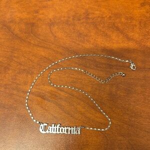 California choker chain-like necklace silver plated. 17” length 3” extension.